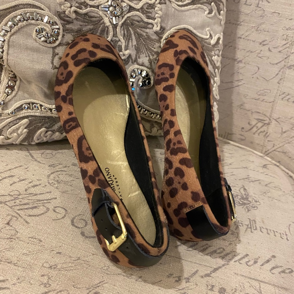 Christian Soriano Size 8. Cheetah print flat, back gold buckle w/brown strap